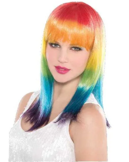 A woman wearing a vibrant rainbow wig with straight bangs and long hair, perfect for Mardi Gras celebrations.
