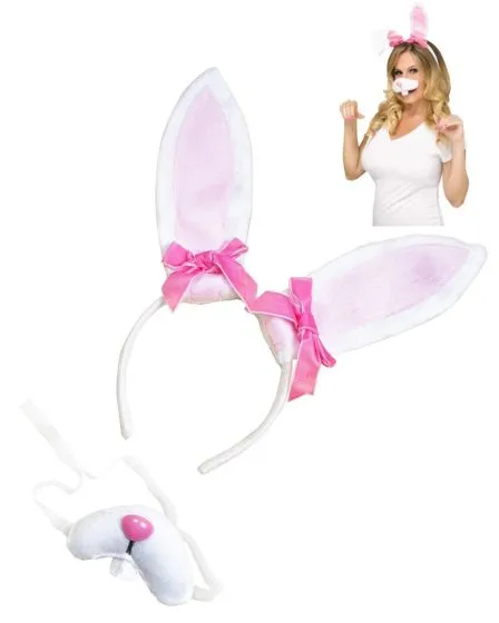 White and pink bunny costume accessory set featuring a headband with tall bunny ears, pink bows, and a matching bunny nose with whiskers. A woman wearing the accessories is shown in the background.